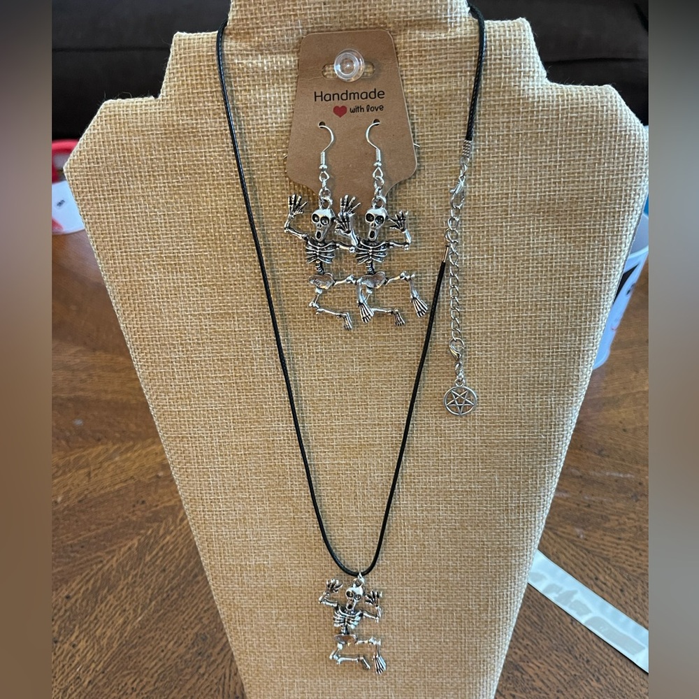 Handcrafted skeleton necklace and matching earrings